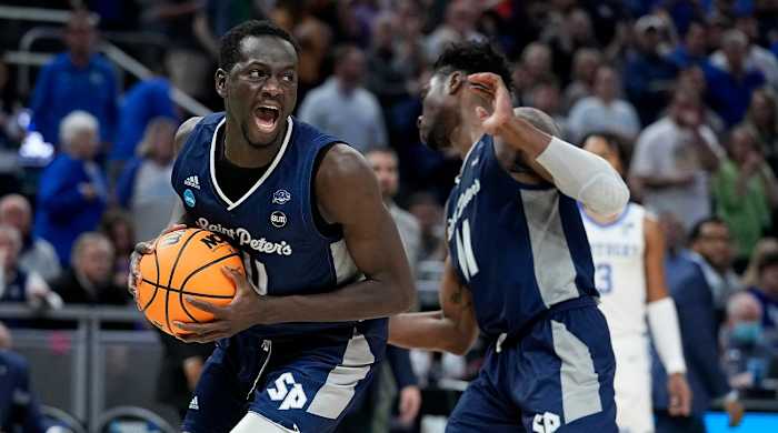 Saint Peter’s forward Hassan Drame celebrates after grabbing a rebound during overtime in a college basketball game against Kentucky in the first round of the NCAA tournament, Thursday, March 17, 2022, in Indianapolis. Saint Peter’s won 85-79.